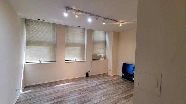 empty room featuring light hardwood / wood-style floors