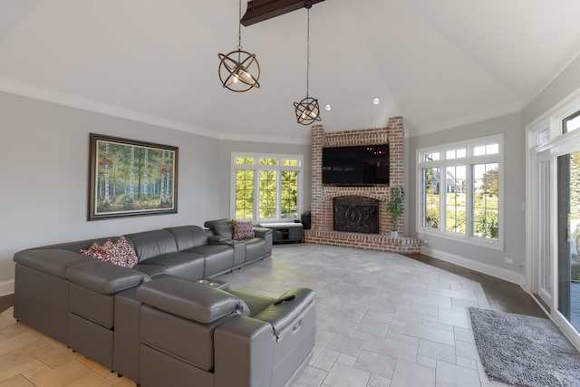 living room with high vaulted ceiling, a wealth of natural light, a chandelier, and a brick fireplace