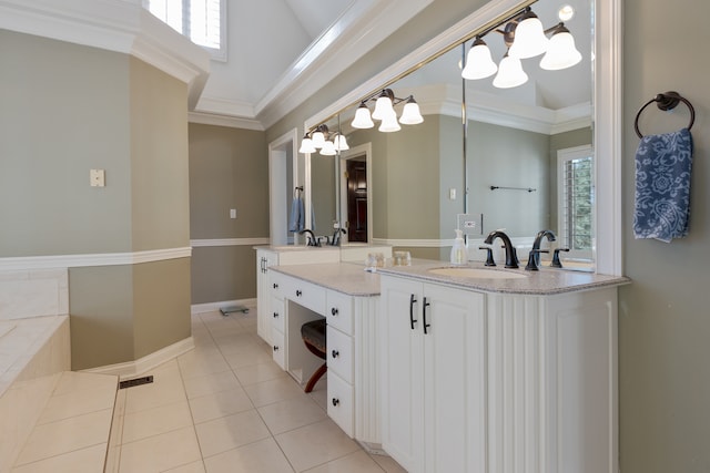 bathroom with crown molding, vanity, plenty of natural light, and a chandelier