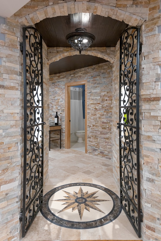 wine cellar with wood ceiling