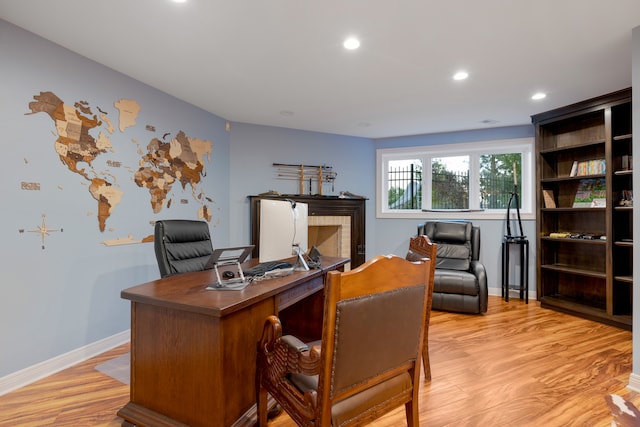 home office with light wood-type flooring