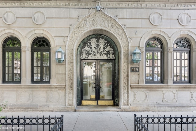 entrance to property featuring french doors