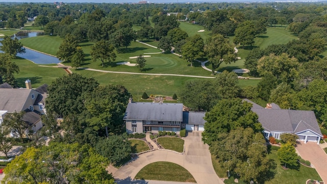 bird's eye view with a water view and golf course view