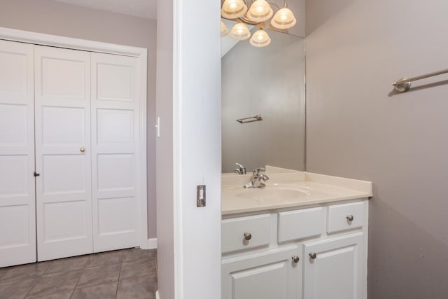 bathroom featuring tile patterned floors and vanity