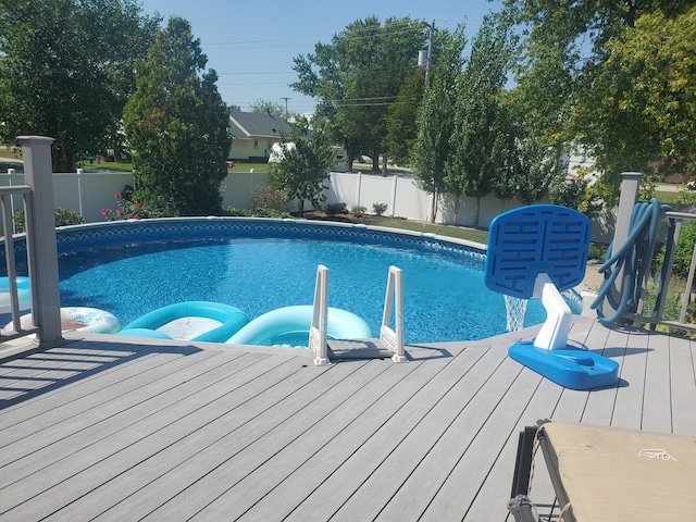 view of pool featuring a wooden deck