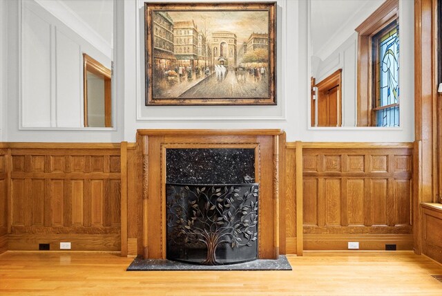 details featuring hardwood / wood-style floors and ornamental molding