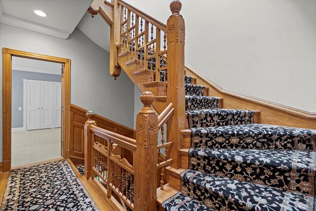 stairs featuring carpet