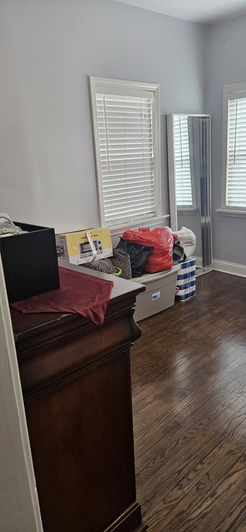 bedroom featuring dark hardwood / wood-style floors