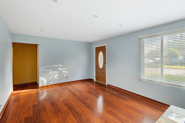 entryway with a healthy amount of sunlight and hardwood / wood-style floors