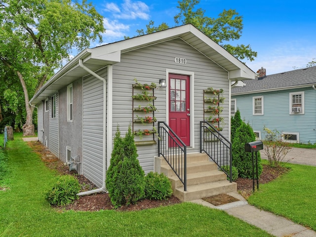 view of front of house with a front yard