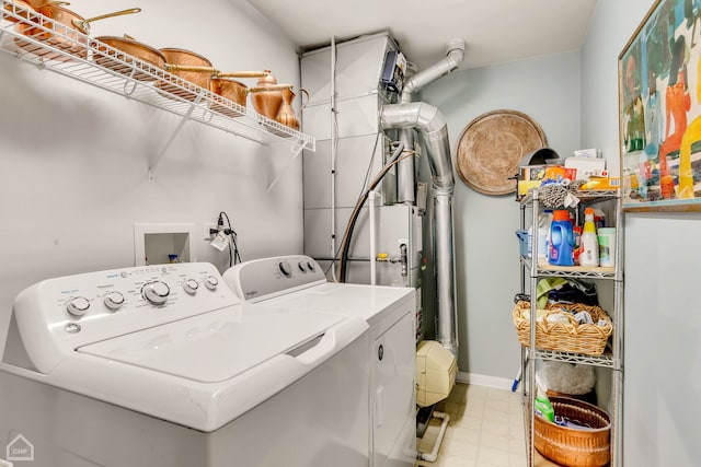 laundry room with separate washer and dryer