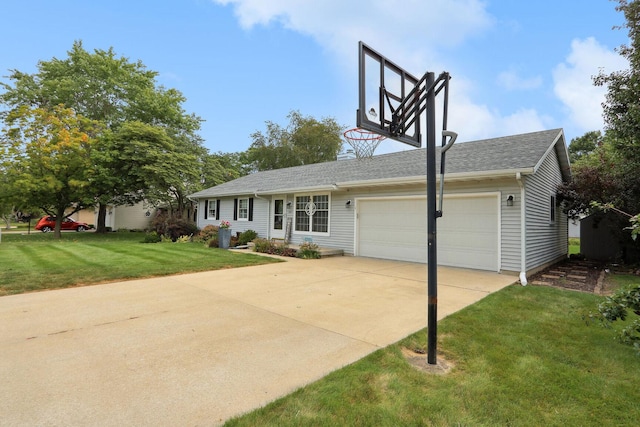 view of front facade with a front yard and a garage