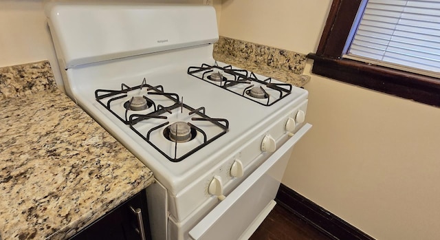 room details with white range with gas cooktop