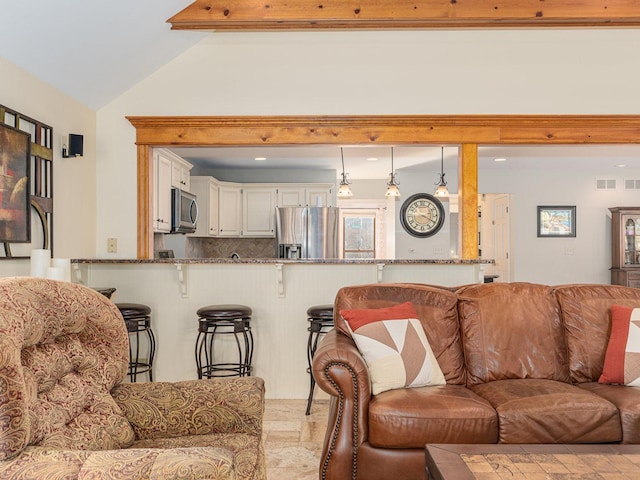 living room with lofted ceiling