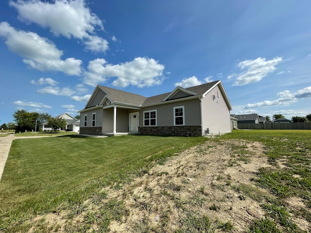 view of front of property with a front lawn