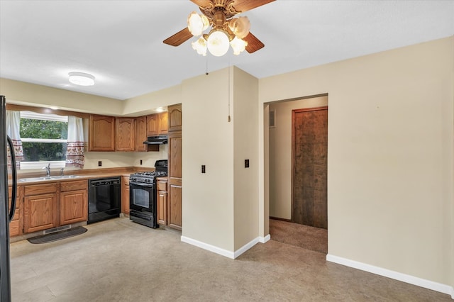 kitchen with ceiling fan, black appliances, and sink