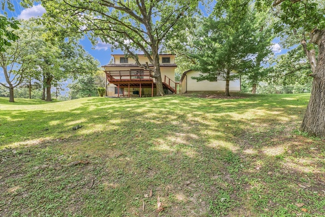 view of yard featuring a deck