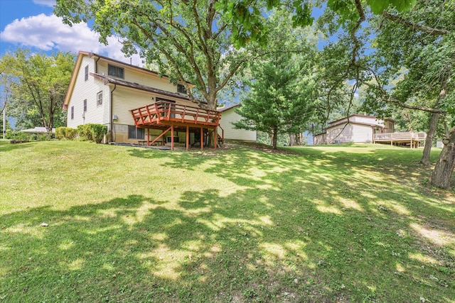 view of yard featuring a wooden deck