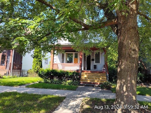 view of front of property featuring covered porch