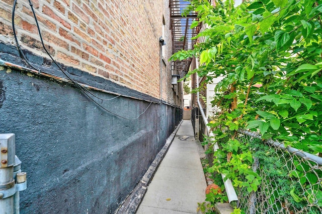 exterior details featuring brick siding