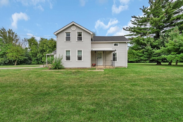 view of front of home with a front yard