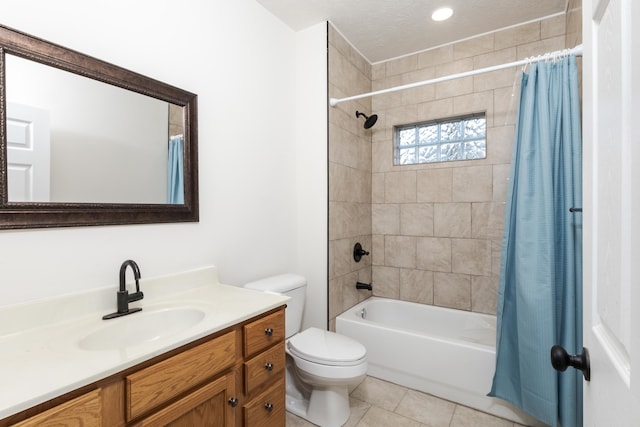 full bathroom featuring shower / bath combination with curtain, tile patterned flooring, a textured ceiling, vanity, and toilet