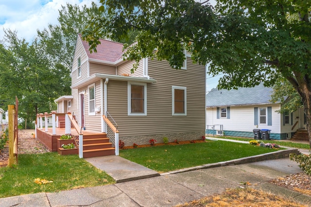 view of front of home with a front lawn