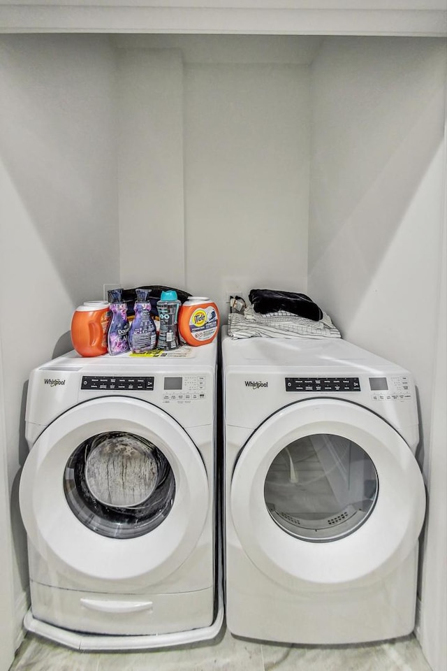 laundry room featuring independent washer and dryer