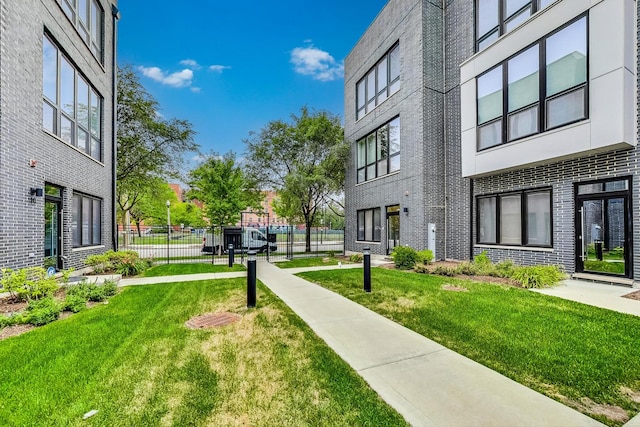 view of community featuring a lawn