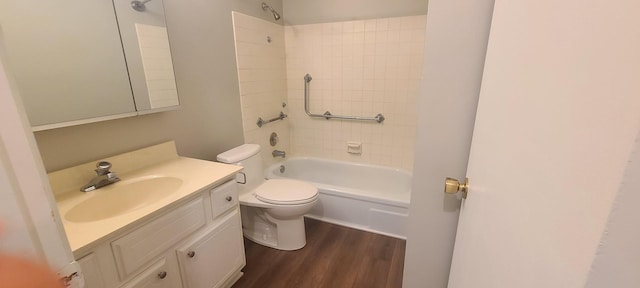 full bathroom featuring vanity,  shower combination, toilet, and wood-type flooring