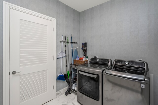 laundry area featuring separate washer and dryer