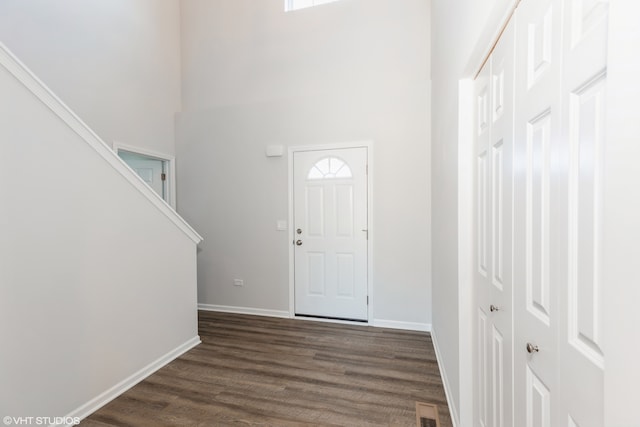 entrance foyer with dark hardwood / wood-style flooring