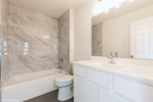 full bathroom with vanity, toilet, tile patterned floors, and tiled shower / bath