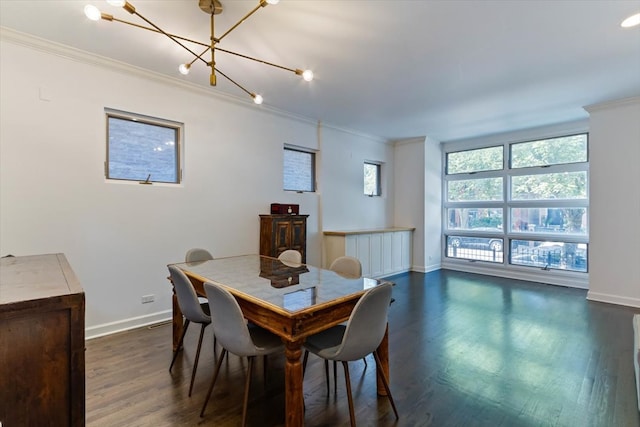 dining area featuring an inviting chandelier, dark hardwood / wood-style flooring, and ornamental molding