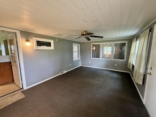 321 E N St, Sheffield, IL 61361 - empty room with wooden ceiling, dark colored carpet, and baseboards