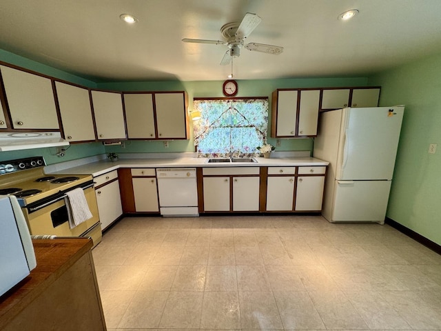 321 E N St, Sheffield, IL 61361 - kitchen with white appliances, a ceiling fan, light countertops, under cabinet range hood, and a sink