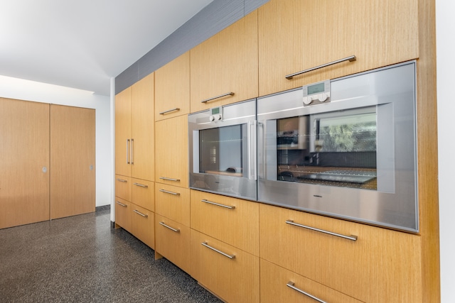 kitchen featuring light brown cabinetry