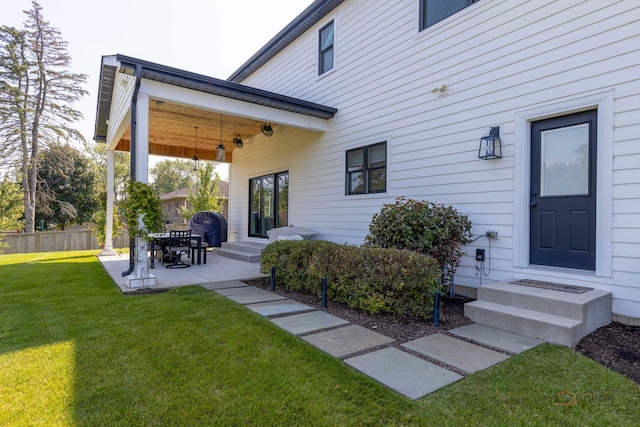 exterior space featuring a patio area and a yard