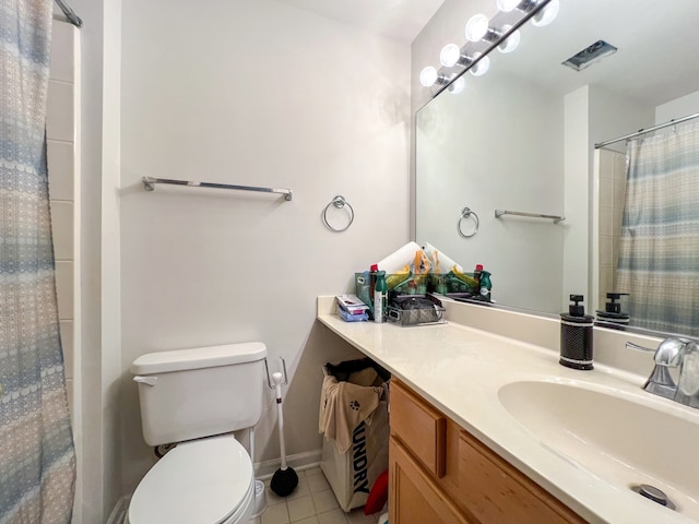 bathroom featuring vanity, toilet, a shower with curtain, and tile patterned floors