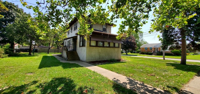 exterior space with a yard