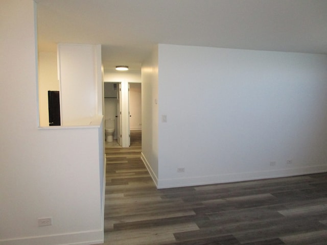 hallway featuring dark hardwood / wood-style floors