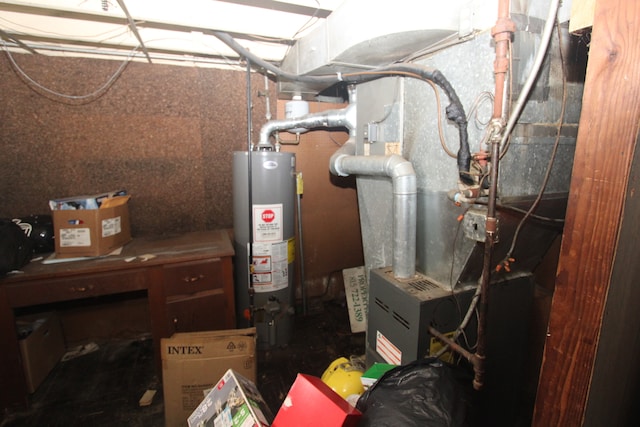 utility room featuring gas water heater