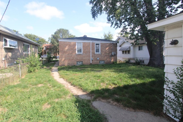 view of yard with fence