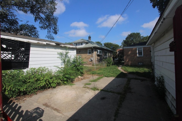 exterior space featuring a patio and fence