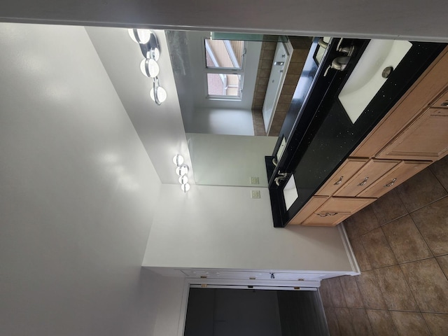 kitchen with light brown cabinetry