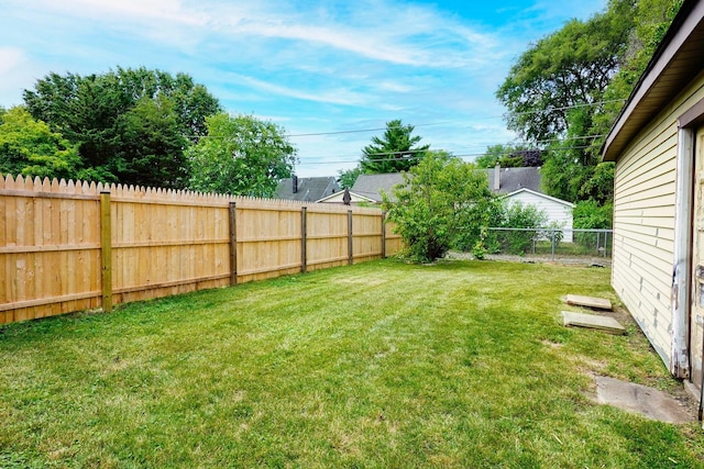 view of yard featuring a fenced backyard