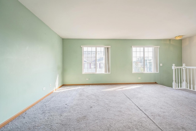 541 Fox Ridge Dr Unit 541, Fox Lake, IL 60020 - carpeted empty room with baseboards and a healthy amount of sunlight