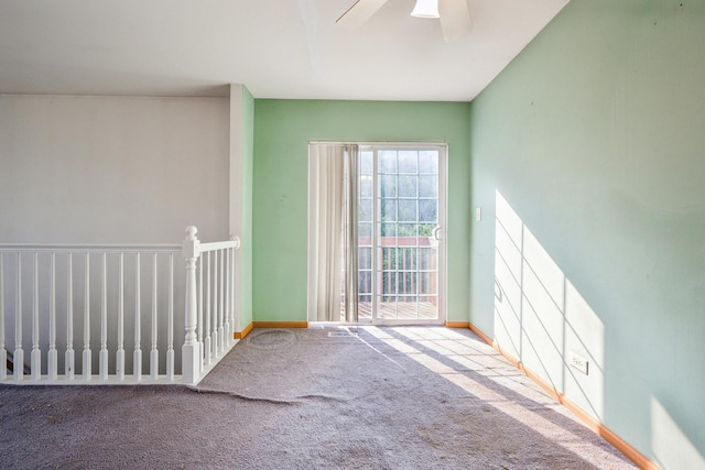541 Fox Ridge Dr Unit 541, Fox Lake, IL 60020 - empty room featuring baseboards, carpet flooring, and a ceiling fan