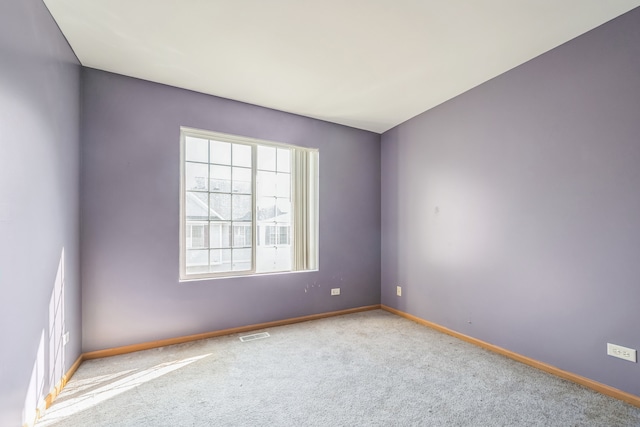 unfurnished room with carpet floors