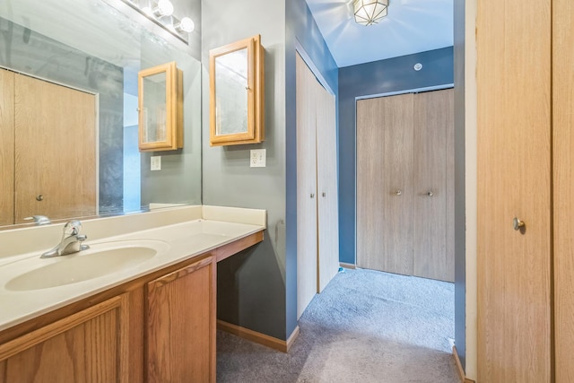 541 Fox Ridge Dr Unit 541, Fox Lake, IL 60020 - bathroom with baseboards and vanity